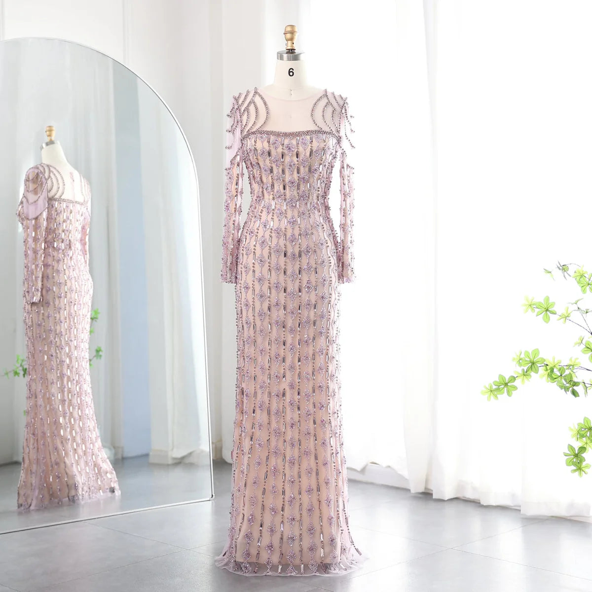 فستان مطرز باكمام طويله