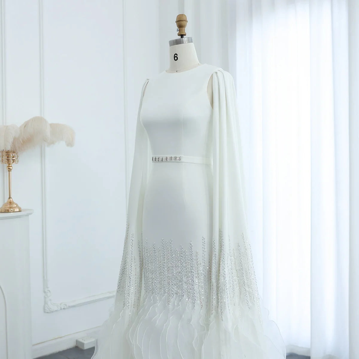 فستان مطرز باكمام كاب طويله