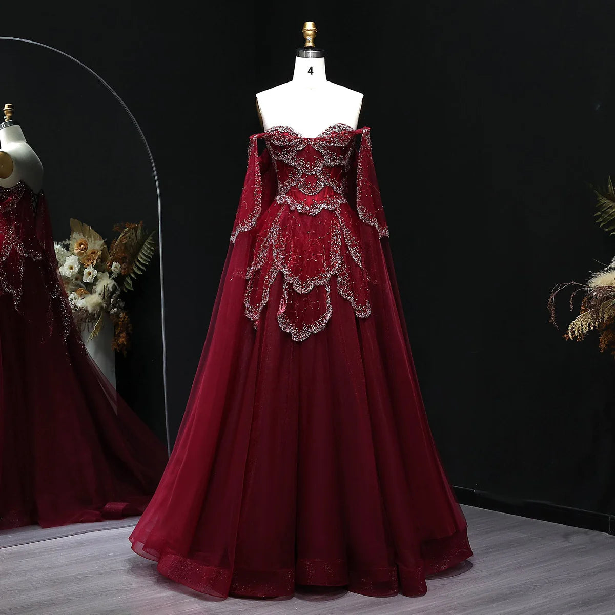 فستان فاخر بأكمام كايب