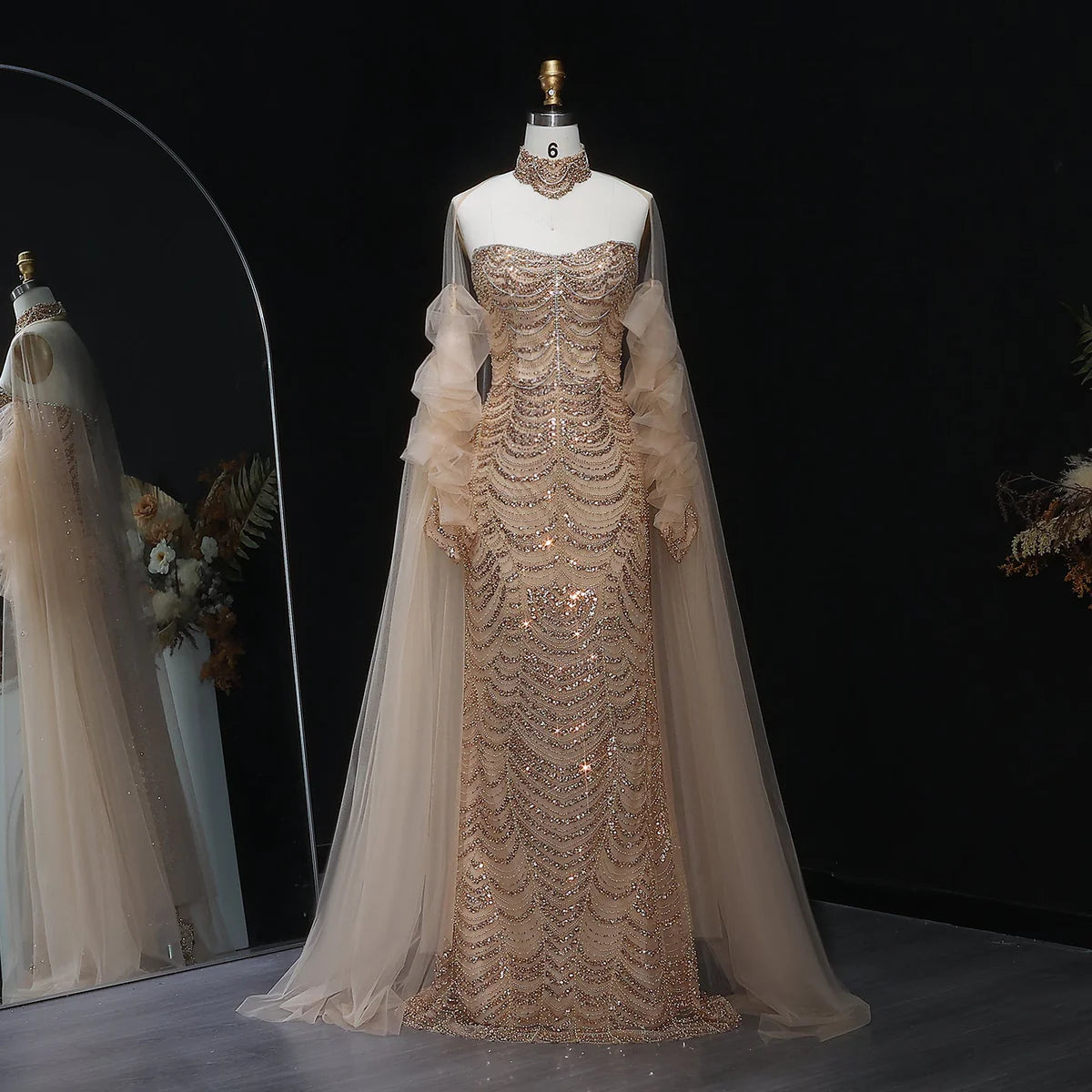 فستان مميز بتطريز يدوي و أكمام طويله