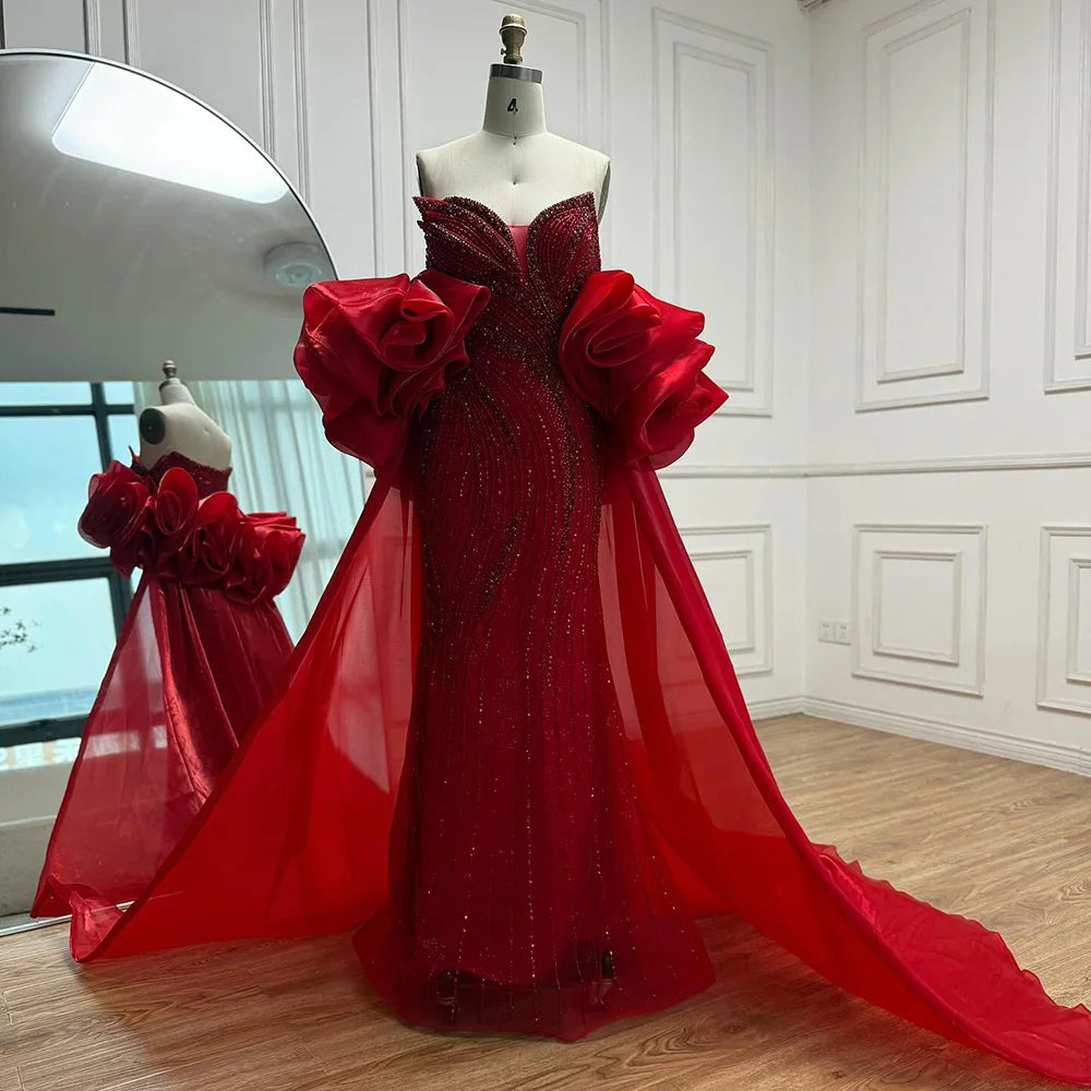 فستان فاخر مطرز مع كايب للمسه أنيقة