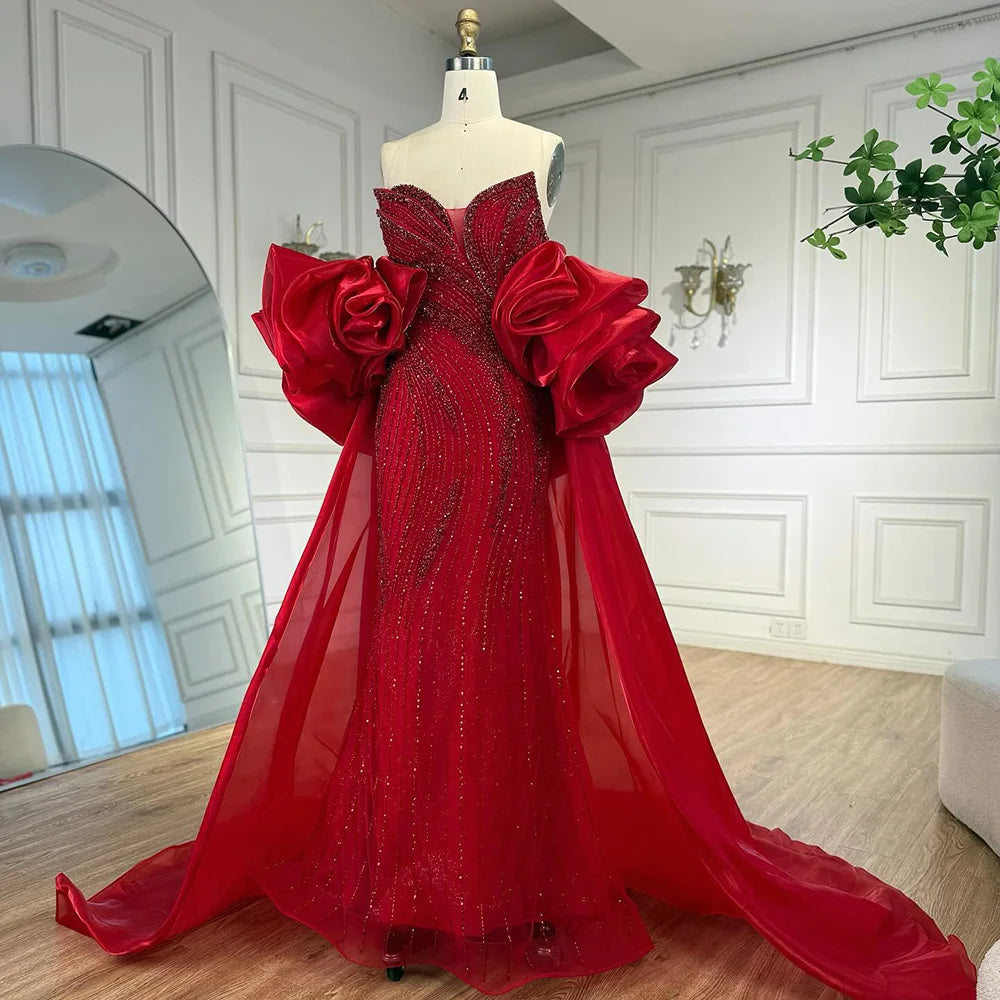 فستان فاخر مطرز مع كايب للمسه أنيقة