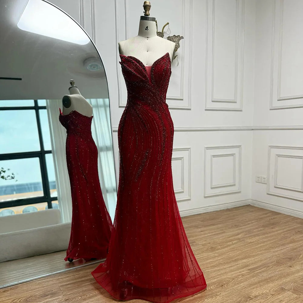 فستان فاخر مطرز مع كايب للمسه أنيقة