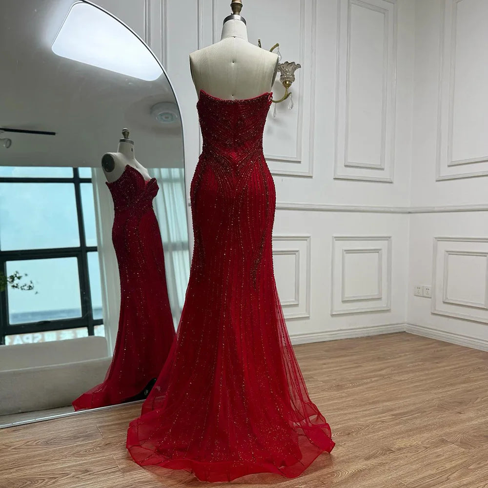 فستان فاخر مطرز مع كايب للمسه أنيقة