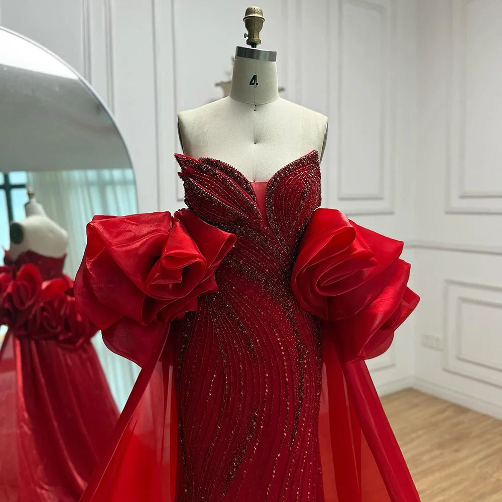 فستان فاخر مطرز مع كايب للمسه أنيقة