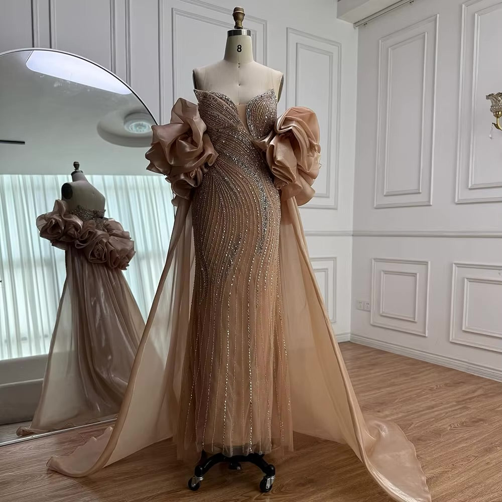 فستان فاخر مطرز مع كايب للمسه أنيقة