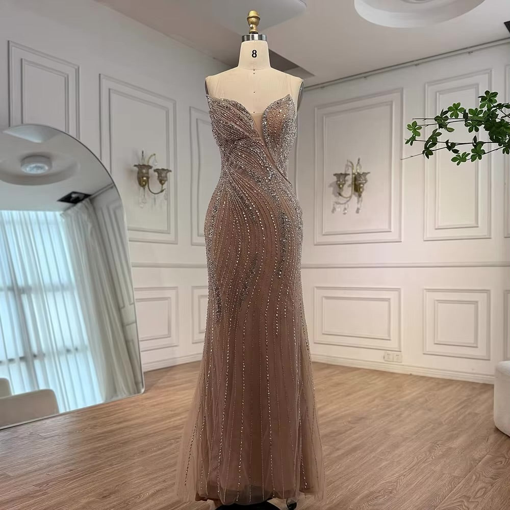 فستان فاخر مطرز مع كايب للمسه أنيقة