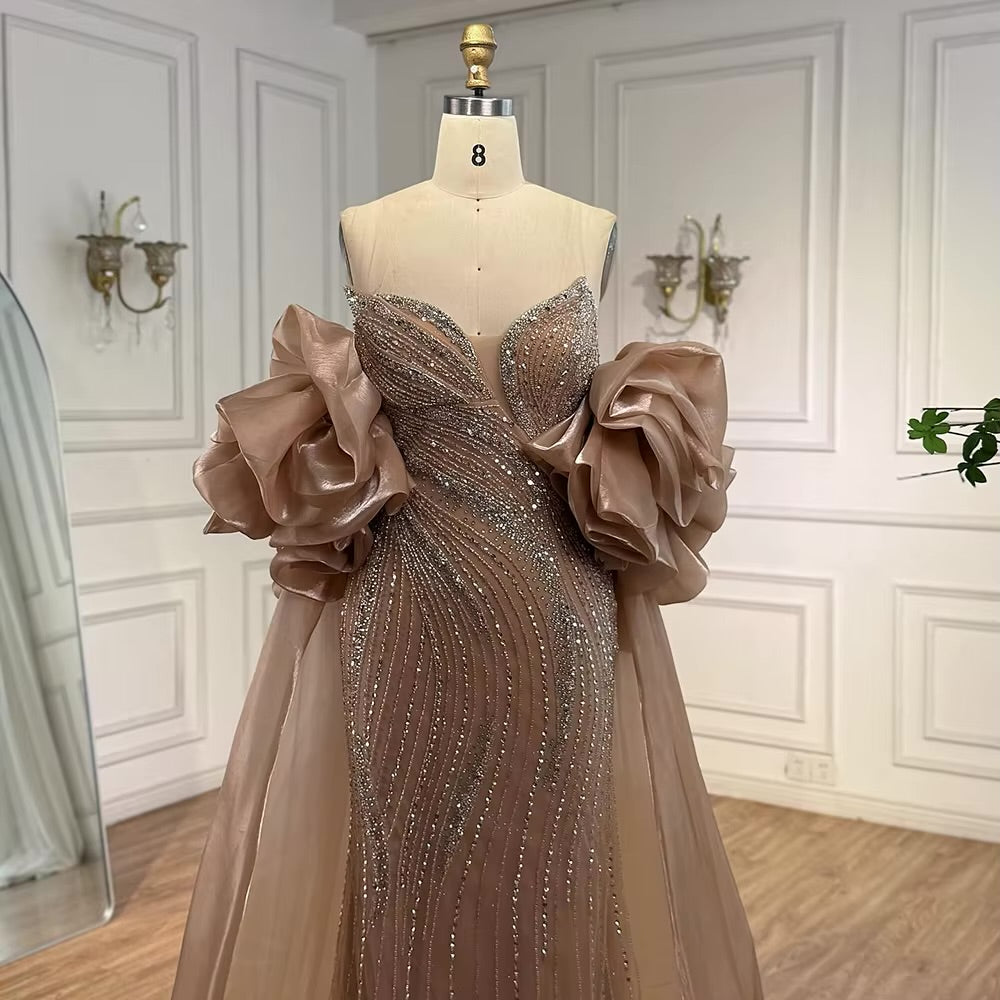 فستان فاخر مطرز مع كايب للمسه أنيقة