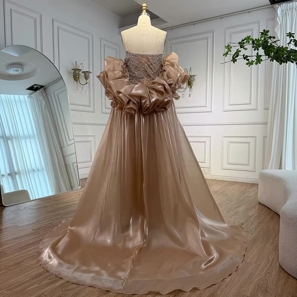 فستان فاخر مطرز مع كايب للمسه أنيقة