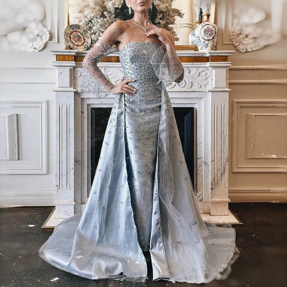 فستان انيق مطرز بذيل طويل